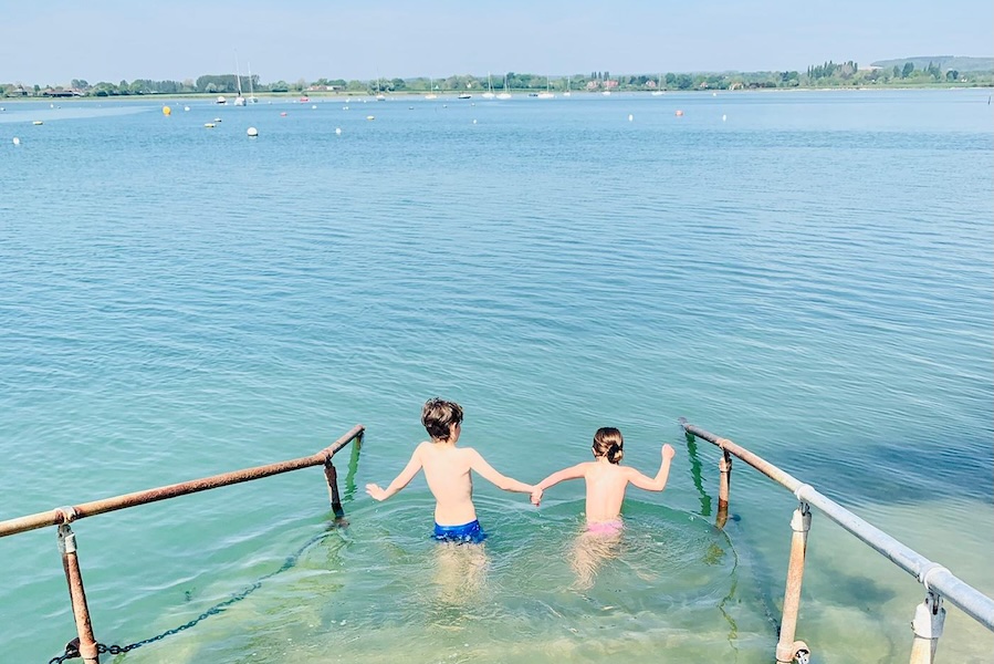Children playing in Bosham staying in a holiday let
